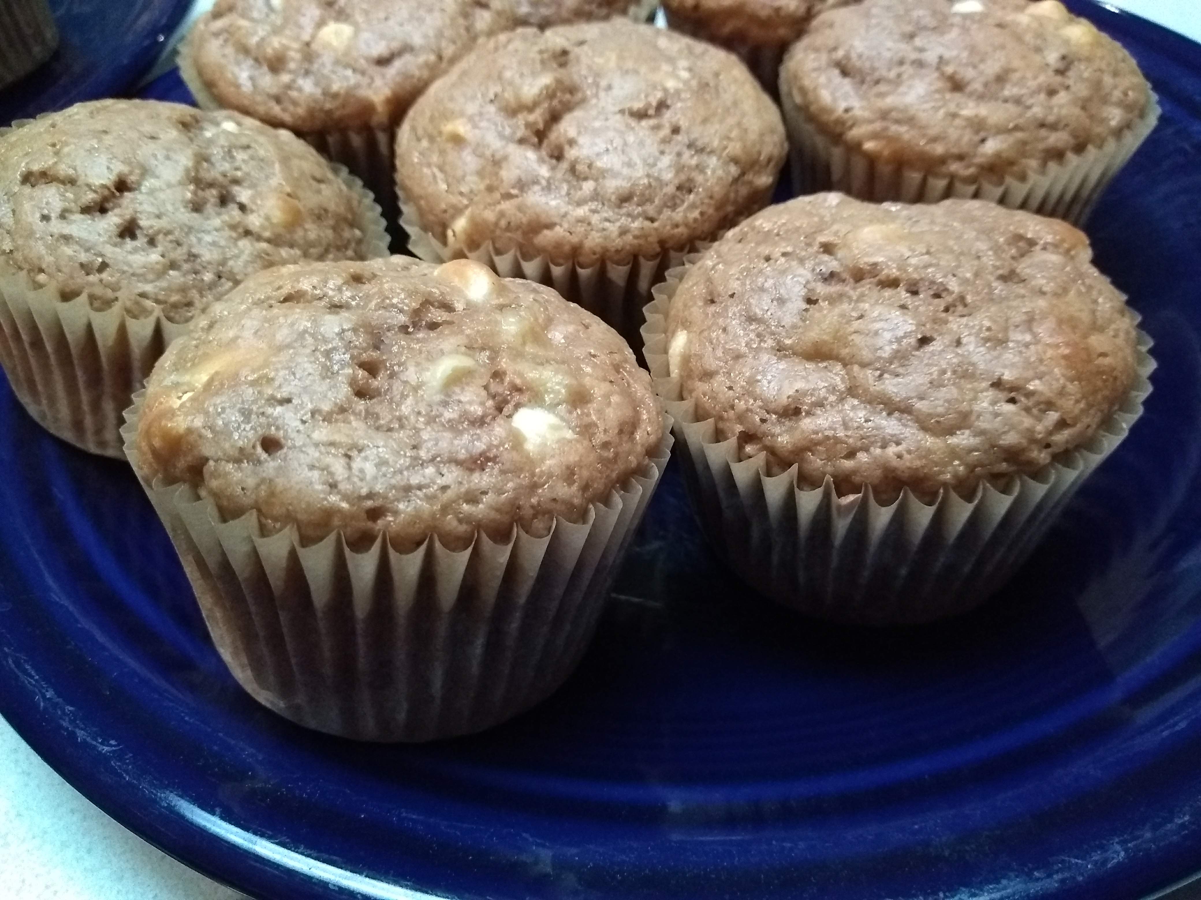 Banana White Chocolate Chip Muffins on a blue Fiestaware plate